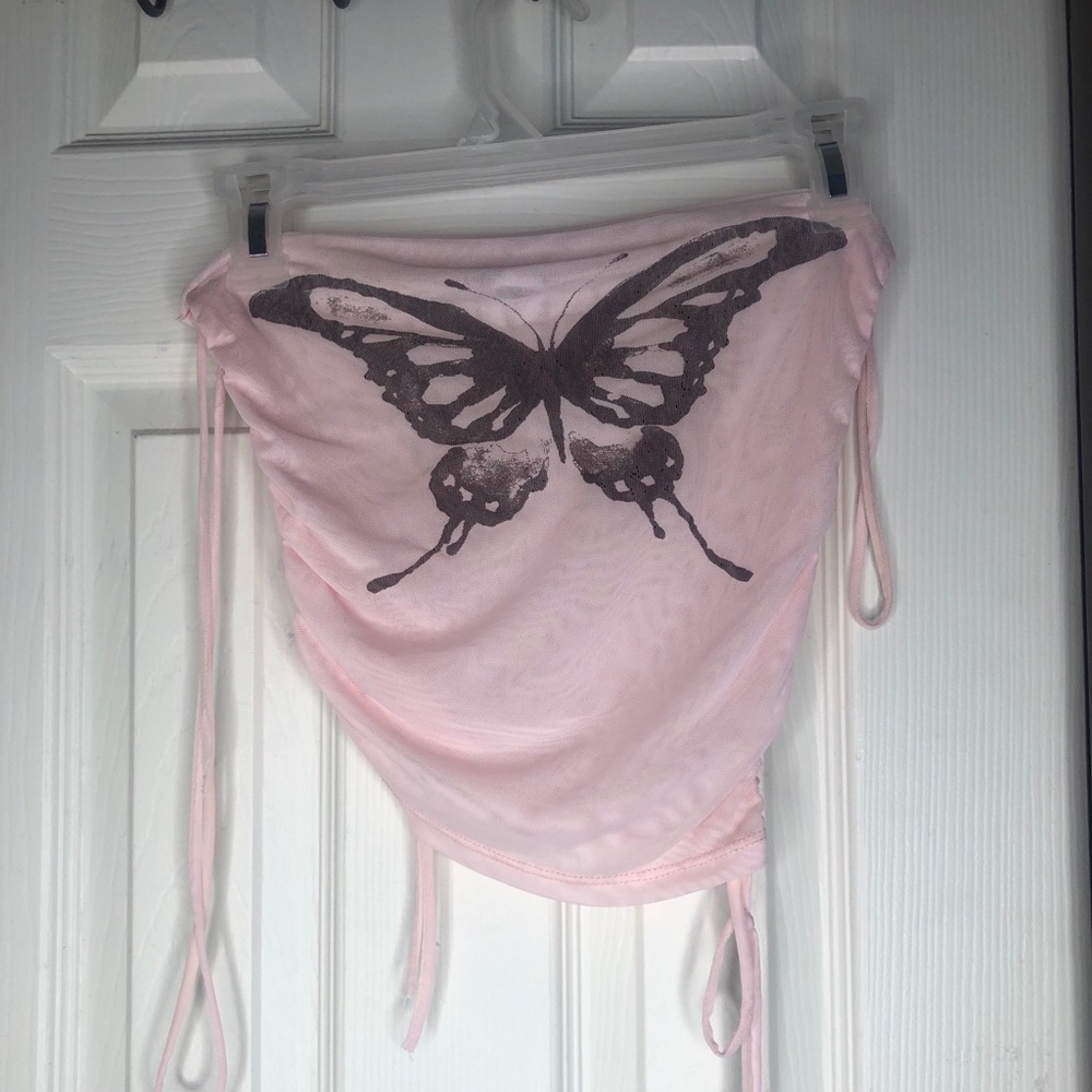 Shop this super cute butterfly mesh top💓